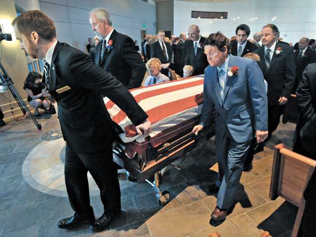 Mourners celebrate life of former leader