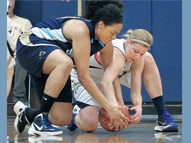 Women's college basketball: Heartbreaker for TMC