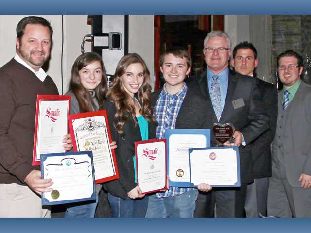 Officers installed, volunteers celebrated