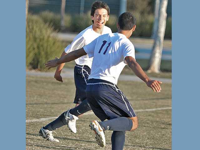 Prep soccer: Hit the mark, beat the ’Mark