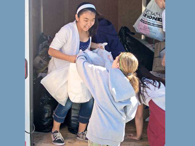 Students give back with Project Puppy Love
