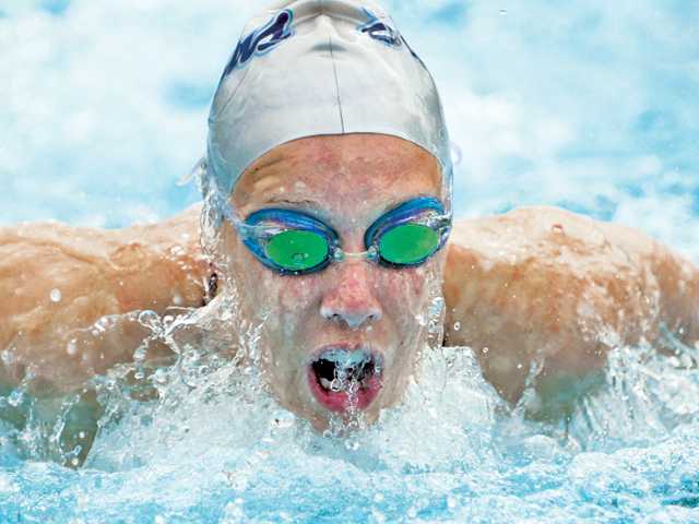 Prep swimming: ’Cats, Cents split meet