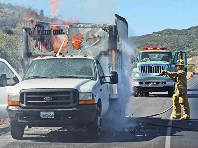 UPDATE: Truck fire ignites brush in Tejon Pass