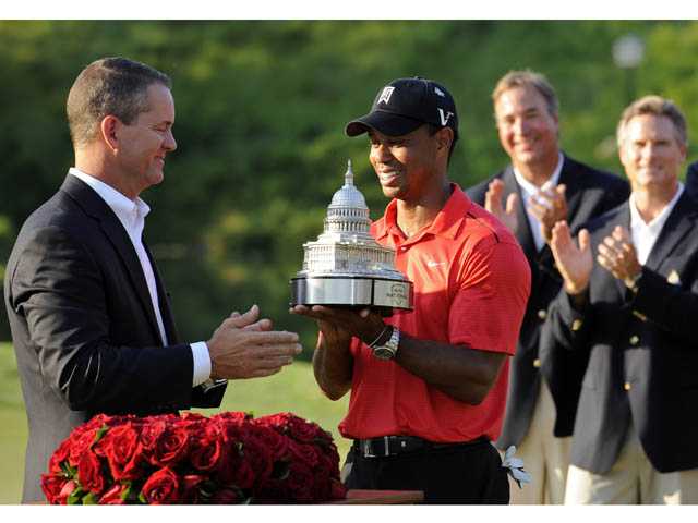 Tiger Woods squeaks out a win at Congressional 