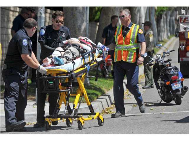 Woman receives minor injuries in scooter crash
