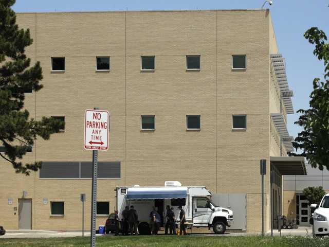 Report: Suspect described killings in package 