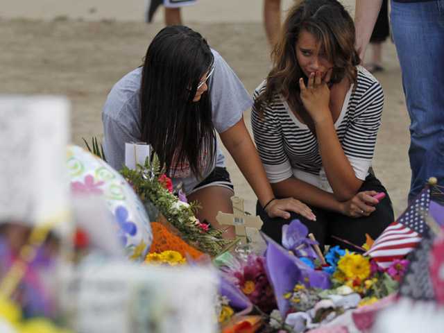 Colorado shooting suspect faces formal charges 