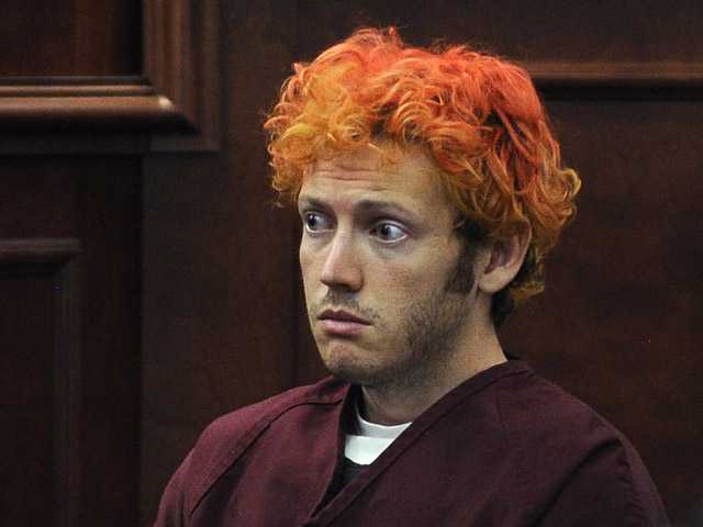 Holmes doesn't react to talk of struggling victims 