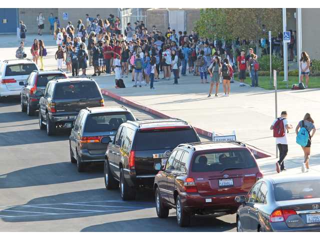 Traffic snarls accompany students back to school