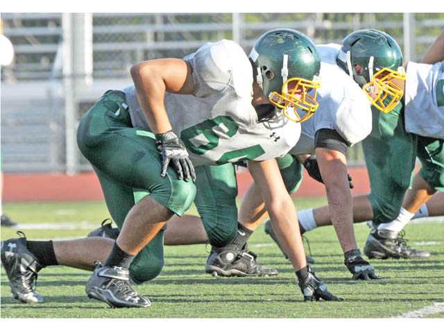 Prep football: On the defensive