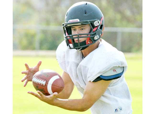 Prep football: New culture on campus
