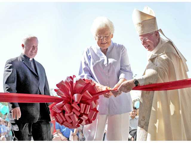 Bishop cuts ribbon