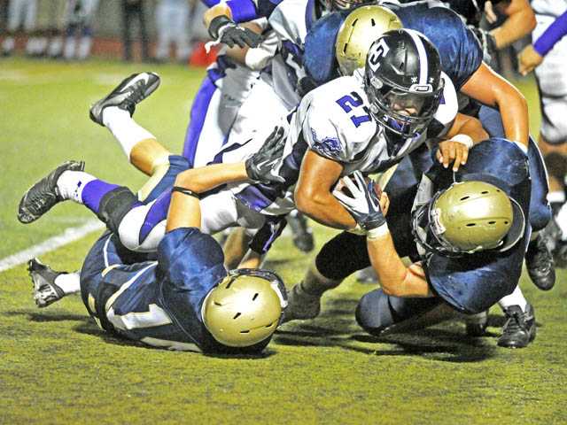 Prep football: Wildcats see it slip away