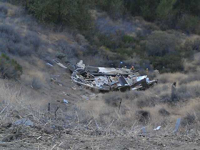 UPDATED: Empty motor home rolls over side of I-5