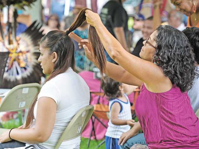 Native Americans socialize, dance at annual powwow at Newhall park