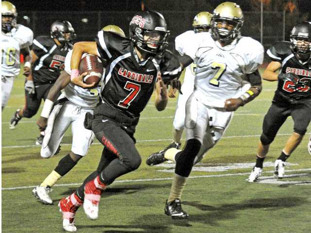 Prep football: Cardinals keep rolling