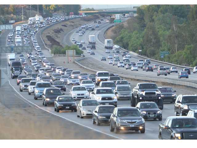 UPDATE: Traffic backs up on local freeway lanes on highly traveled day