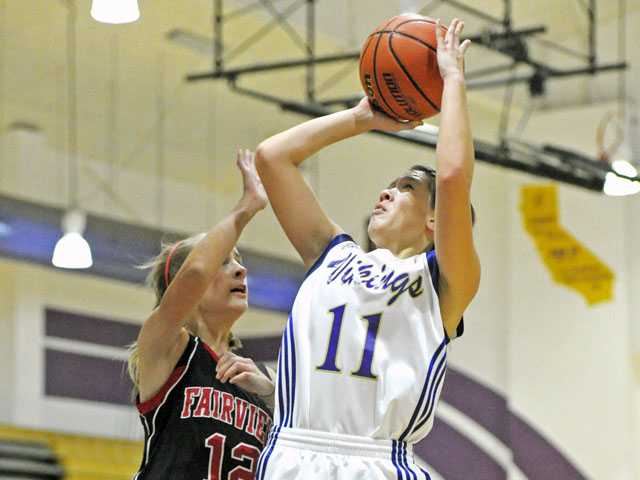 Prep basketball: Hustle beats length