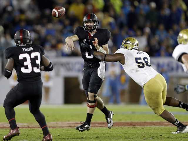 College football: Hogan leads Stanford past UCLA 27-24 to win Pac-12 