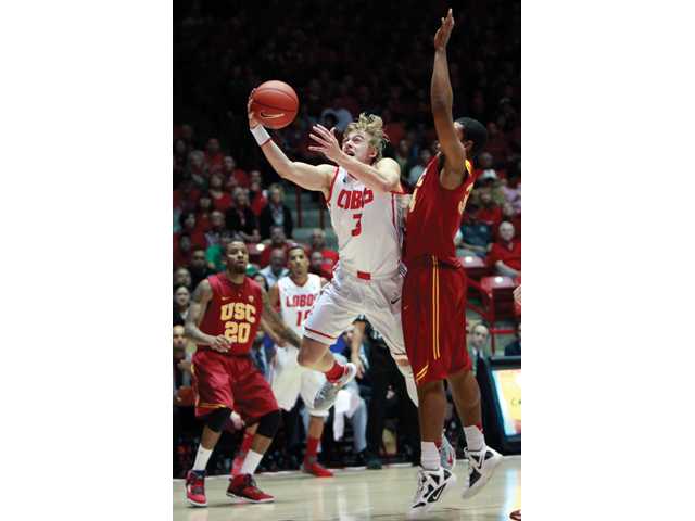College basketball: No. 18 New Mexico rallies for 75-67 win over USC 