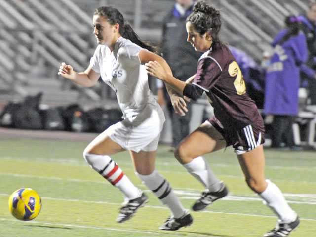 Prep soccer: Vikings do just enough