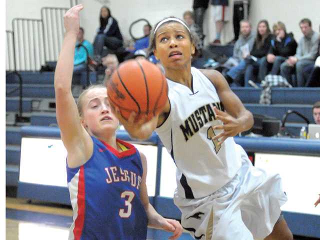 College basketball: TMC remains perfect