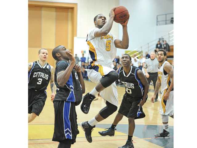 College men’s basketball: Cougars work OT 