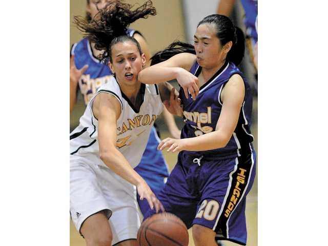 Prep girls hoops: The Cowboys’ three spree