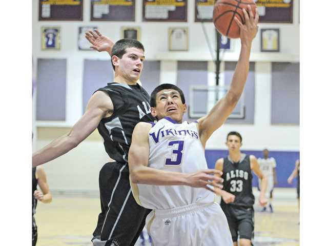 Prep boys basketball: Vikings feel playoff pain
