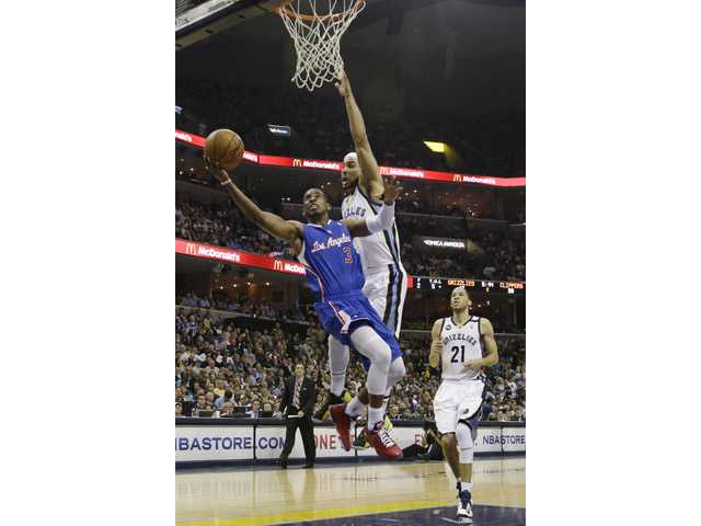 Grizzlies advance with 118-105 win over Clippers 
