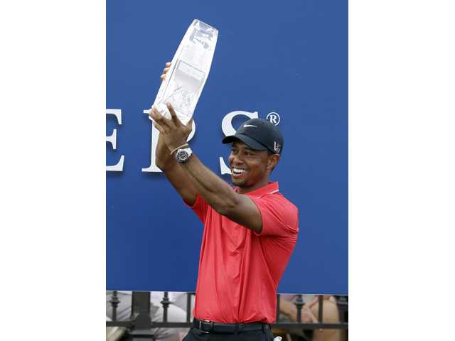 Tiger Woods wins Players Championship 
