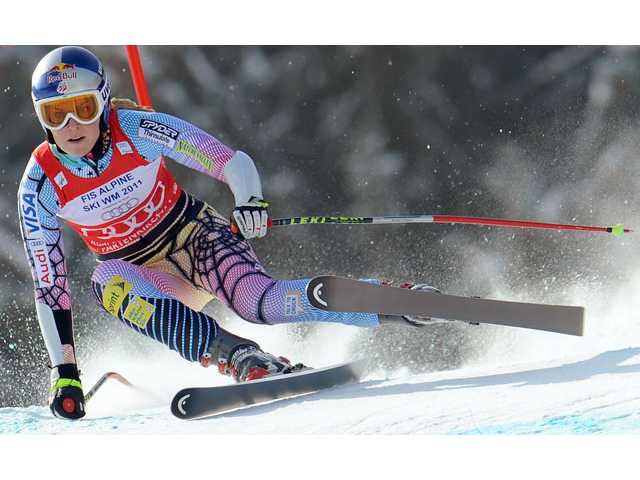 Vonn wins super-G, overall World Cup title