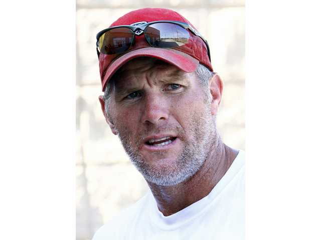 Favre says he hasn't decided about playing again 