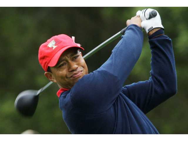 AP Source: Woods back from family counseling 