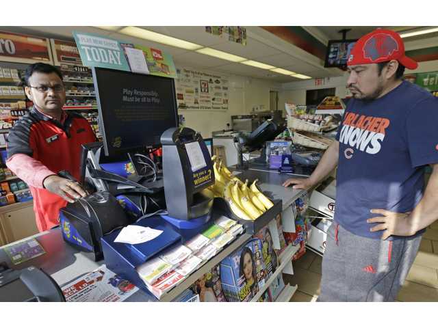 Last-minute fortune seekers buy Powerball