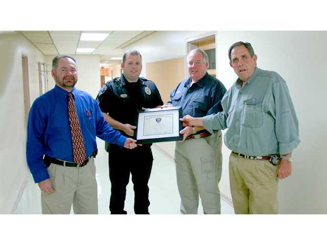Bryant awarded for five-year service