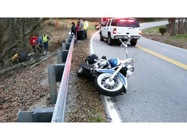 Woman airlifted after bike crash
