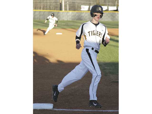 Tigers split with Lions Tigers split with Lions