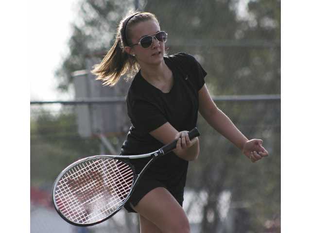 Tennis Teams compete Tennis Teams compete