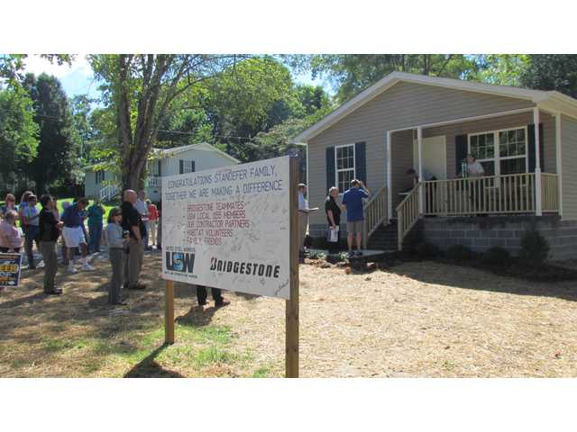 Habitat provides gift of home ownership Habitat provides gift of home ownership