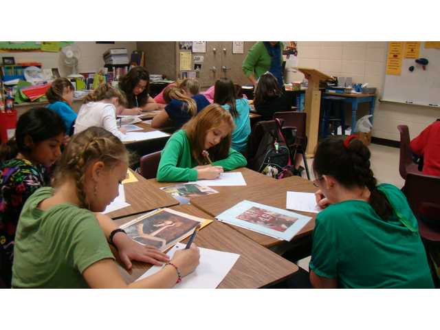 Local school officials warily watch Common Core debate