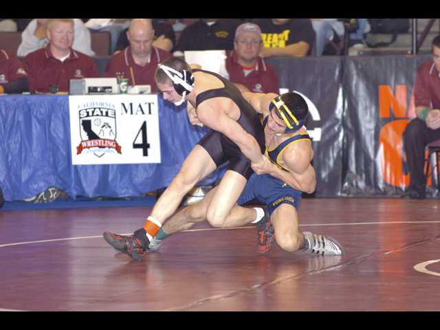 Four local wrestlers move on to second day of State tournament