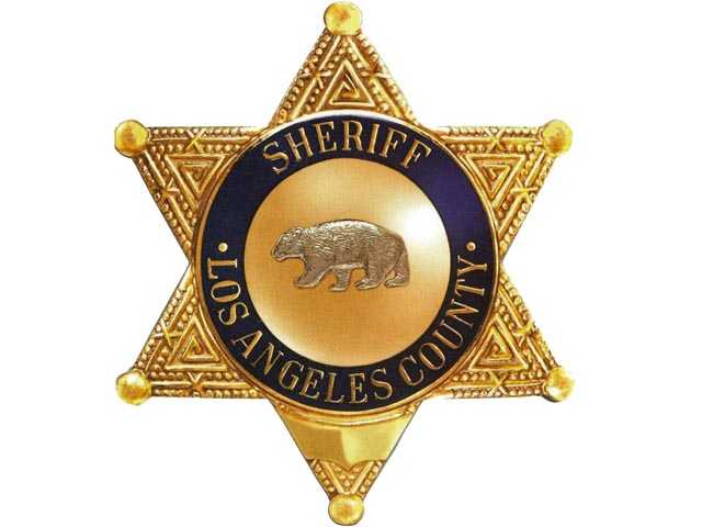 Man at large after threatening security officer