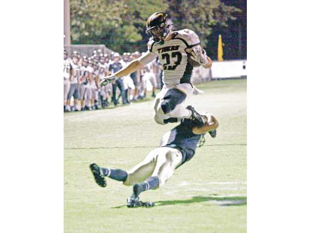 Tigers pluck Owls for region win Tigers pluck Owls for region win