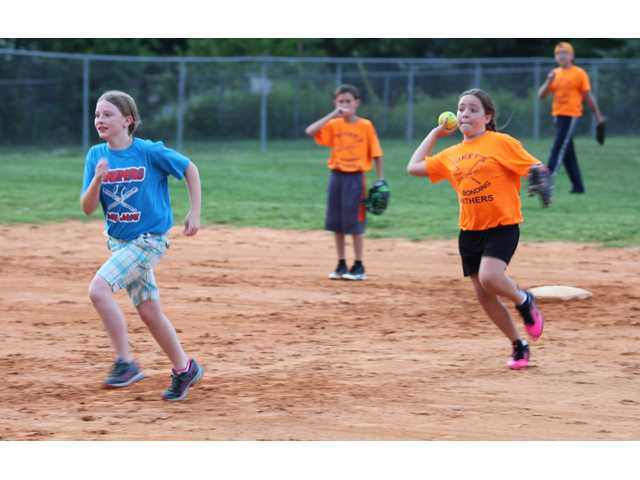 Bill Page softball heats up Bill Page softball heats up