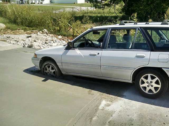 Wet concrete traps motorist Wet concrete traps motorist