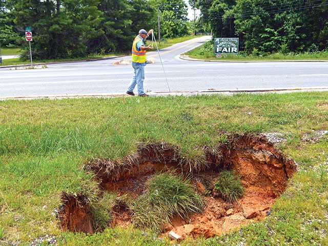 Sinkhole found near highway Sinkhole found near highway