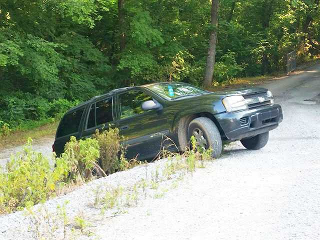 SUV backs off Animal Control driveway SUV backs off Animal Control driveway