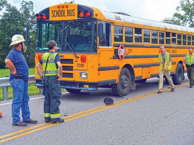 Teen hurt as SUV hits school bus Teen hurt as SUV hits school bus