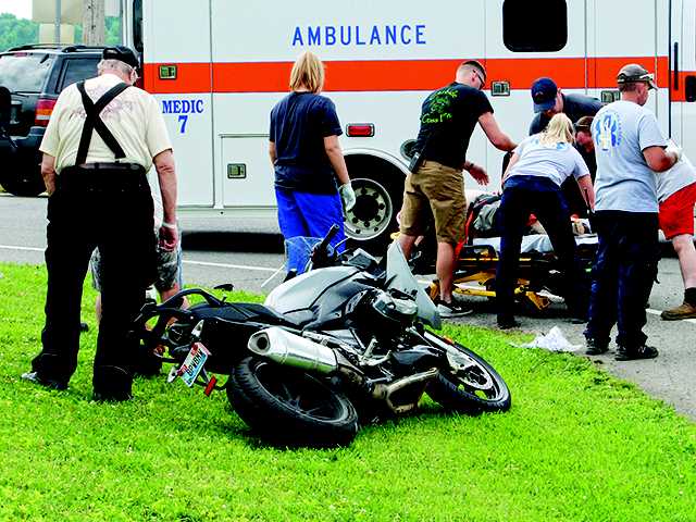 Motocycle rider struck by pickup Motocycle rider struck by pickup